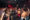 Partygoers dance at a Poof Doof event